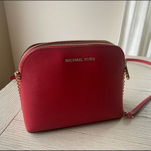 Red Michael Kors crossbody purse